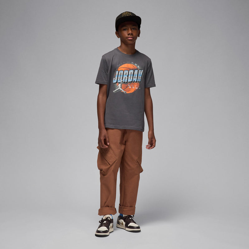 Iron grey youth T-shirt with Jordan front logo graphic, full-body view on model