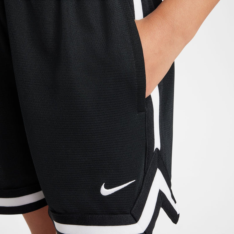 Black youth shorts with white hem stripe and Nike logo on side.