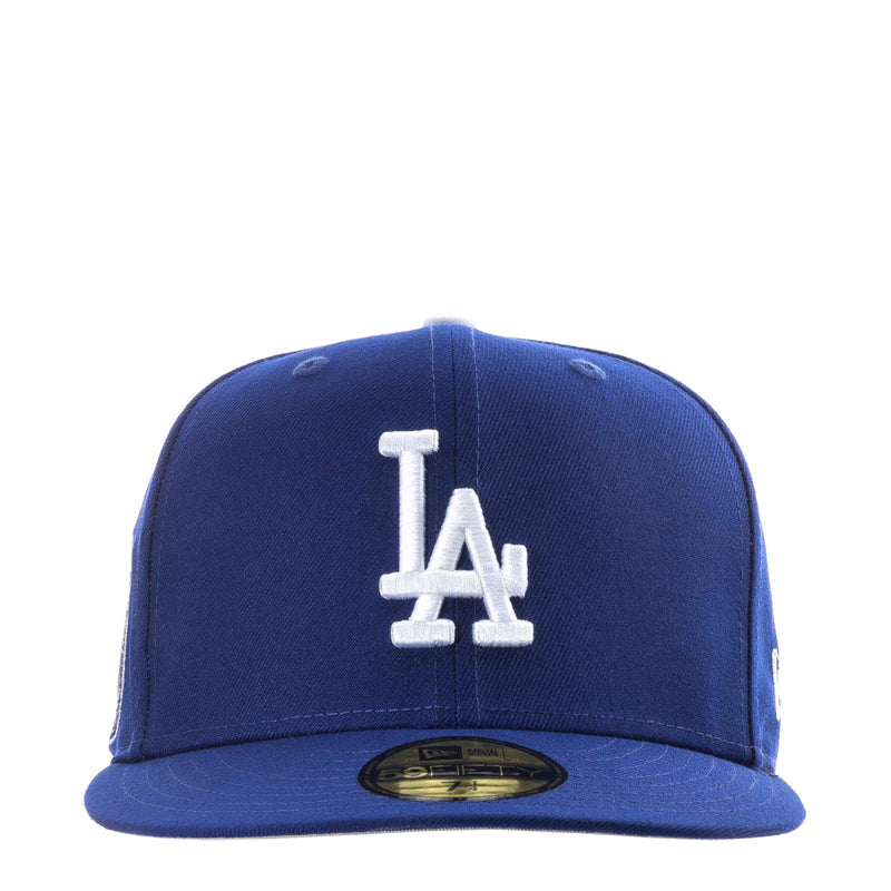 Royal blue baseball cap with white LA logo on front panel.