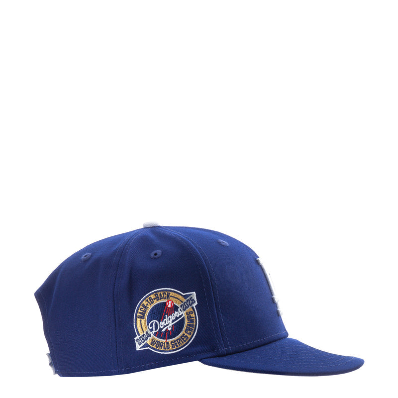 Royal blue baseball cap with circular Dodgers side patch badge