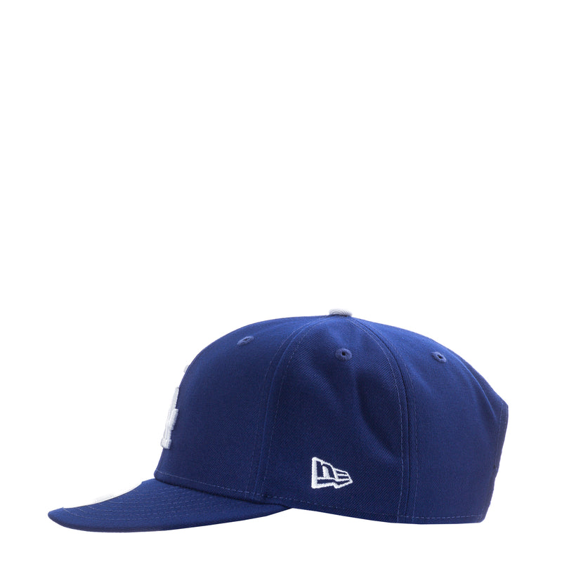 Royal blue baseball cap with small New Era logo patch on front