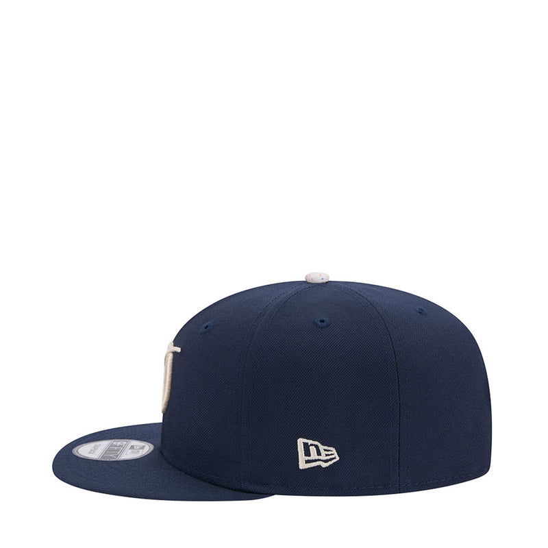 Navy kids baseball cap with small MLB batterman logo on side