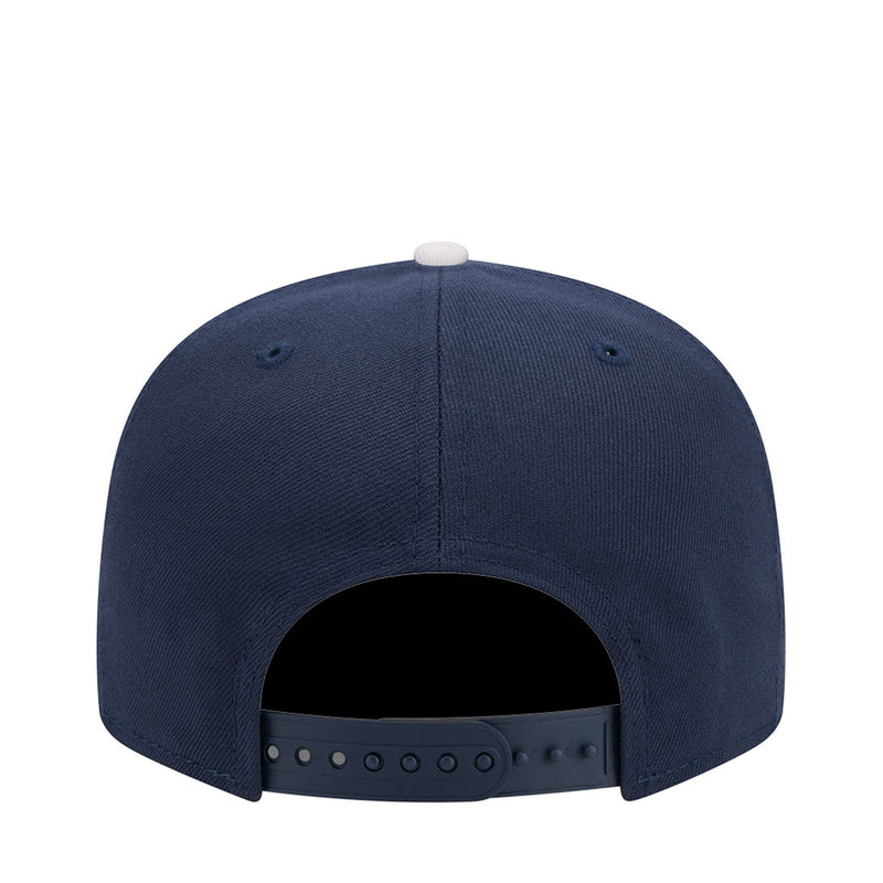 Navy kids baseball cap with snapback closure and ventilation eyelets