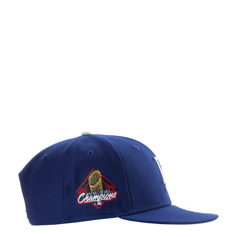 Royal blue baseball cap with multicolor World Series Champions side patch