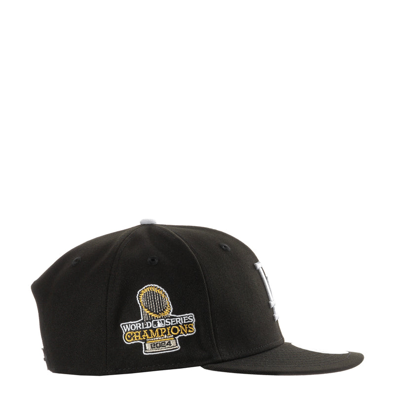 Black baseball cap with World Series Champions side patch in gold and white