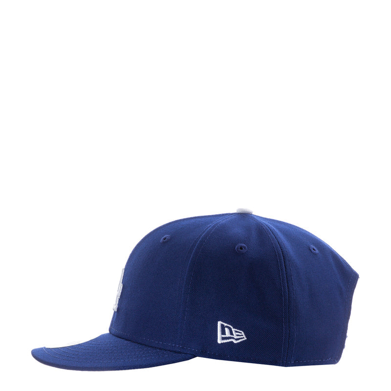 Royal blue baseball cap with New Era logo patch