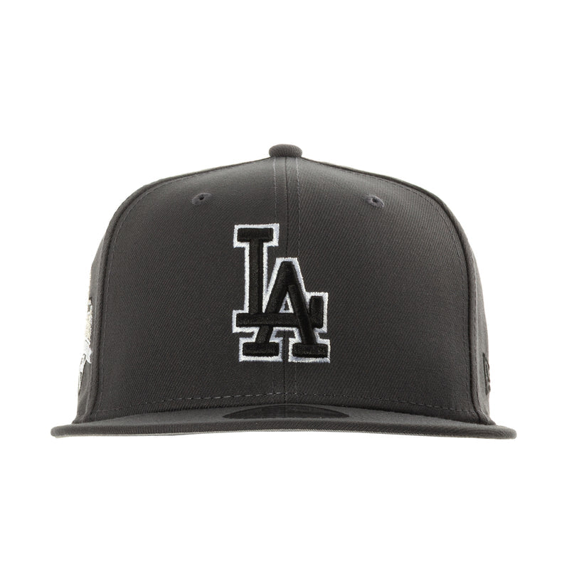 Dark graphite baseball cap with white LA logo patch on front