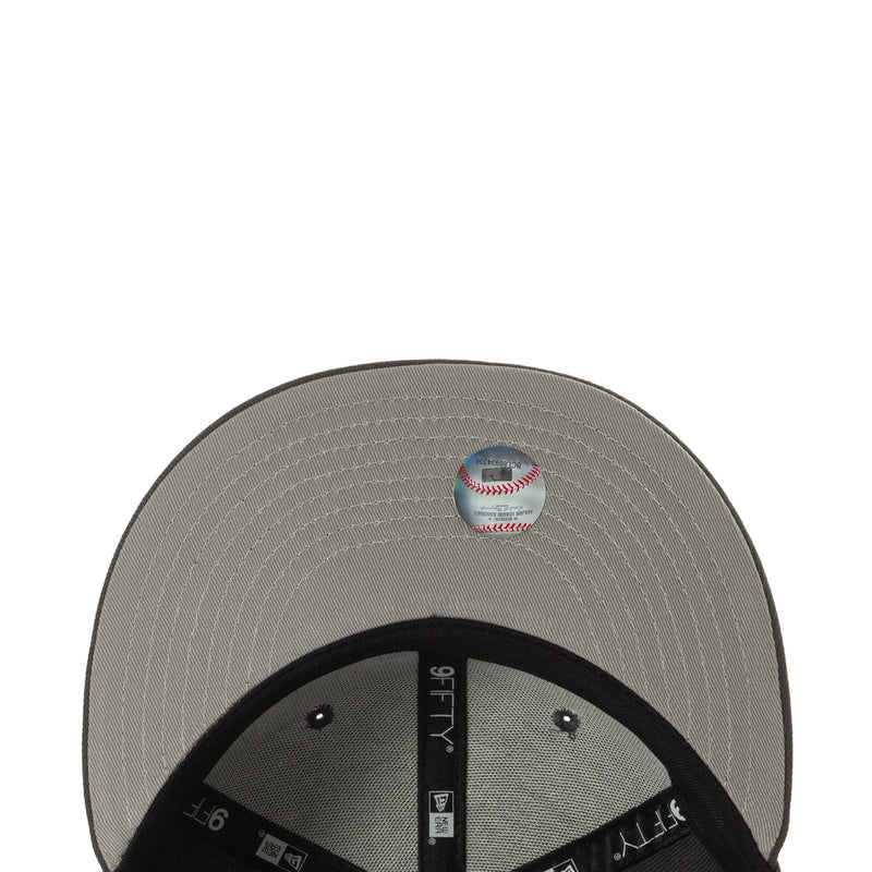 Gray cap underside with stitched panels and MLB-style baseball graphic