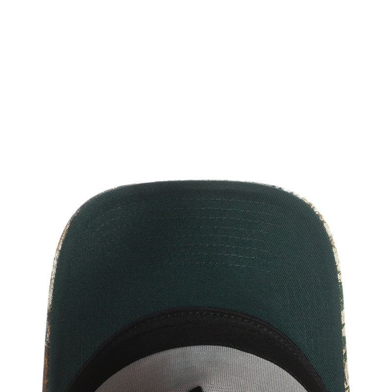 Dark green baseball cap top with stitched crown and black front brim edge