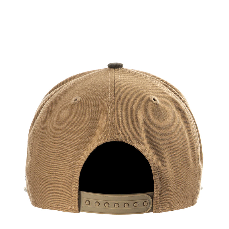 Desert tan baseball cap with back strap and black eyelets