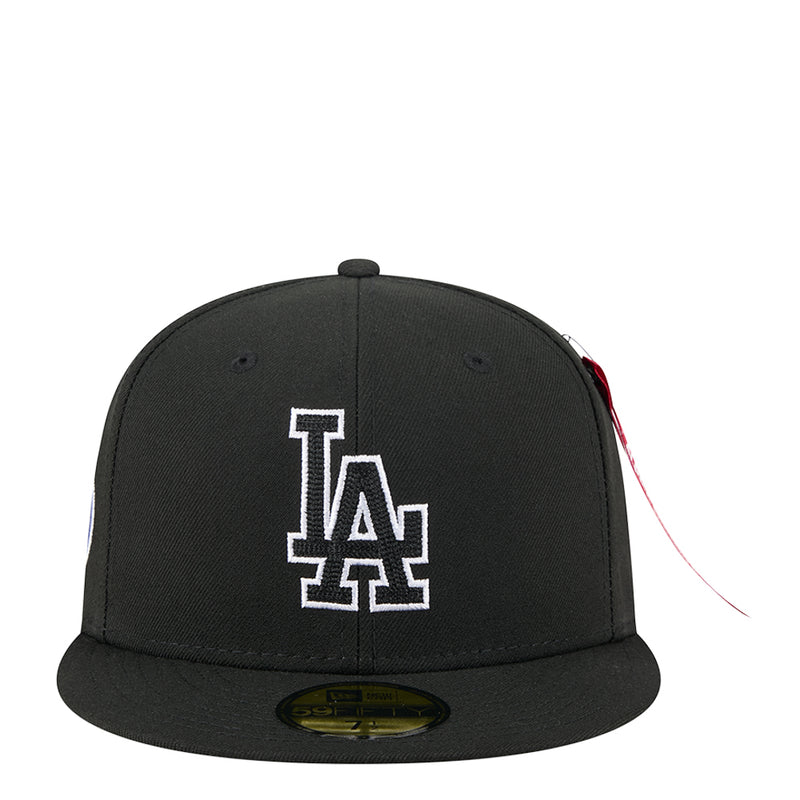 Black baseball cap with raised LA Dodgers logo patch on front
