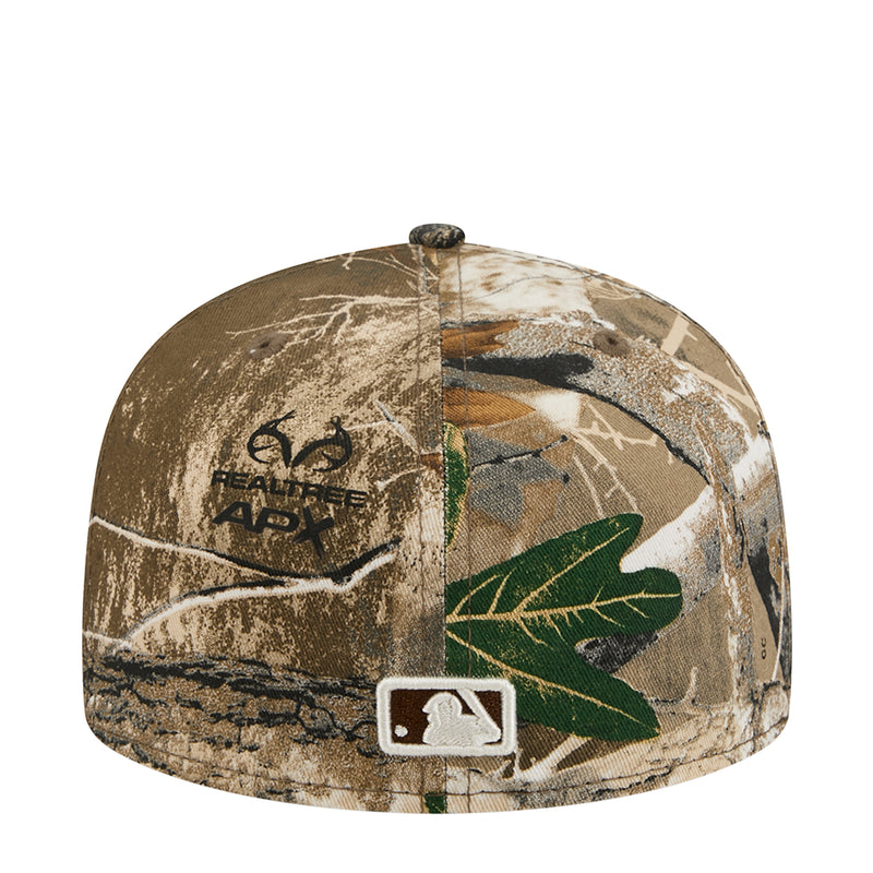 Camo baseball cap with white baseball logo patch and green graphic