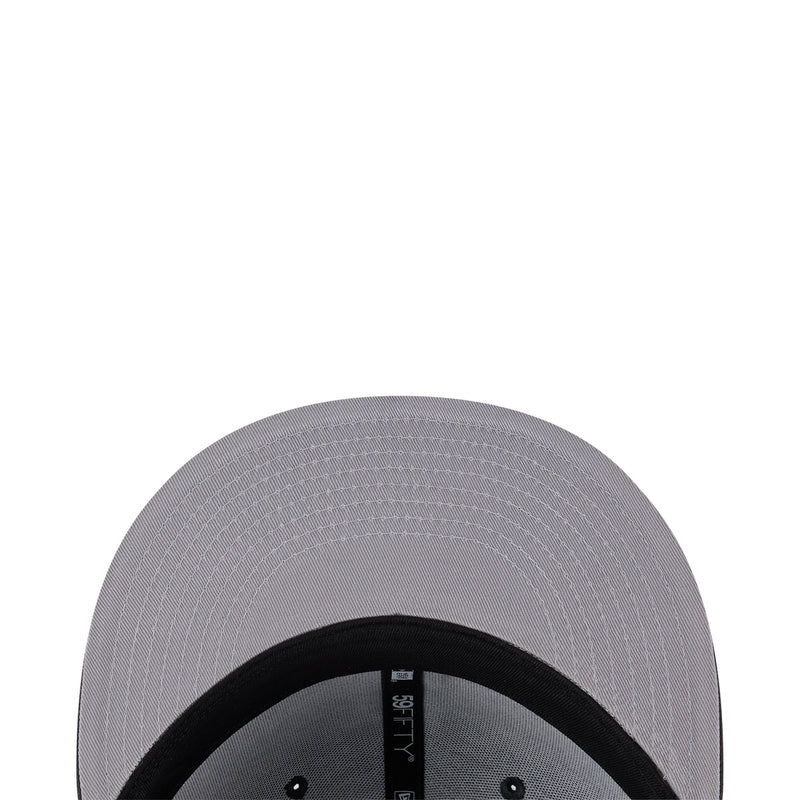 Light gray baseball cap close-up with black inner band and brand label
