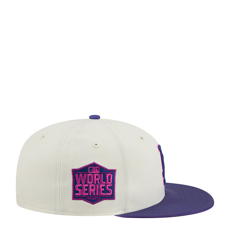 Two-tone baseball cap, cream crown with purple brim and World Series patch logo.
