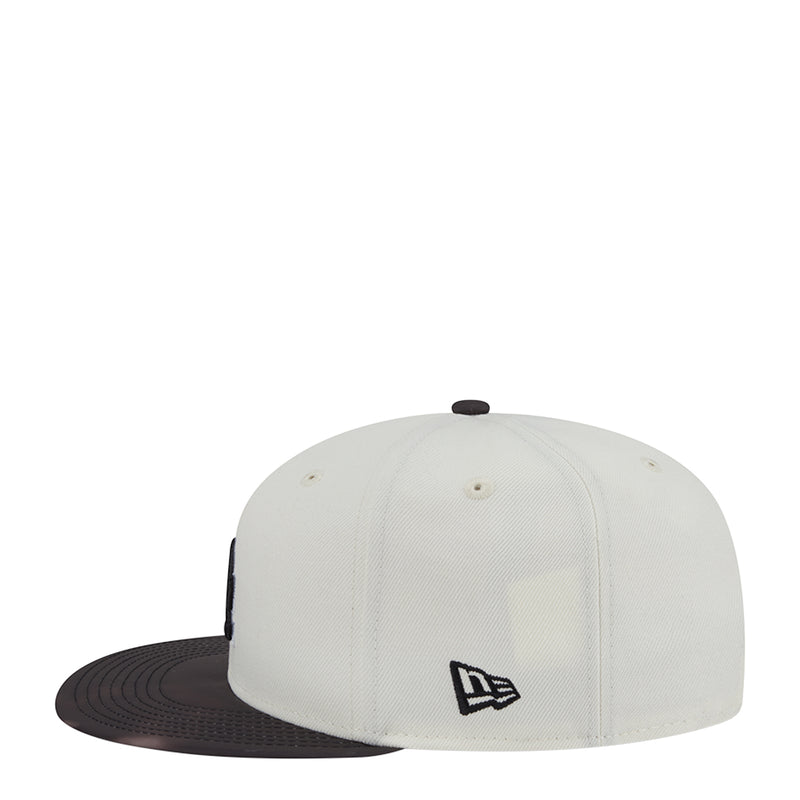 Two-tone baseball cap, white crown with New Era side logo and black brim