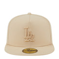 Beige A-frame baseball cap with raised LA logo on the front and stitched brim