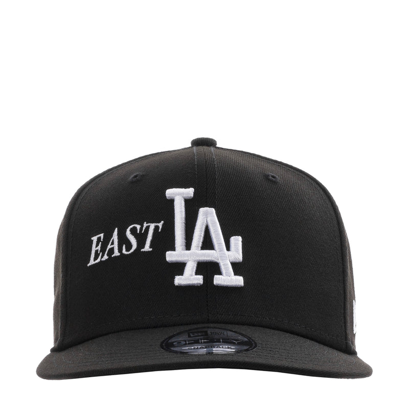 Black baseball cap with East LA logo and white LA monogram on front
