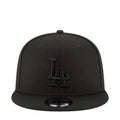 Black baseball cap with raised LA logo on front panel