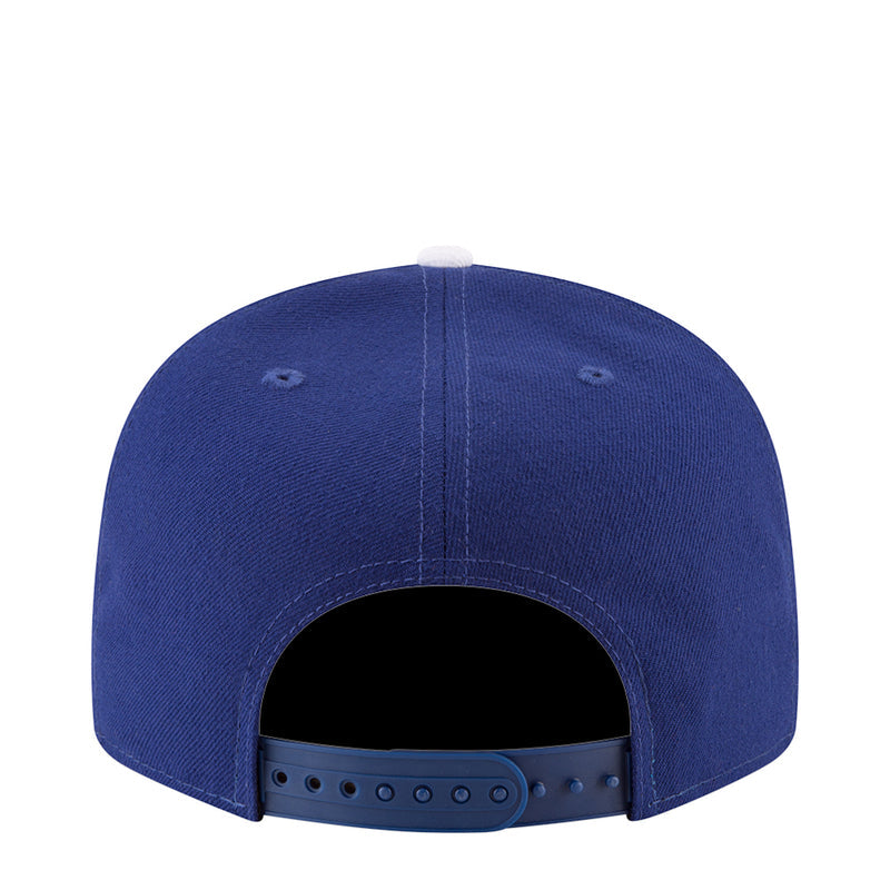 Royal blue baseball cap back with adjustable strap and ventilation eyelets.