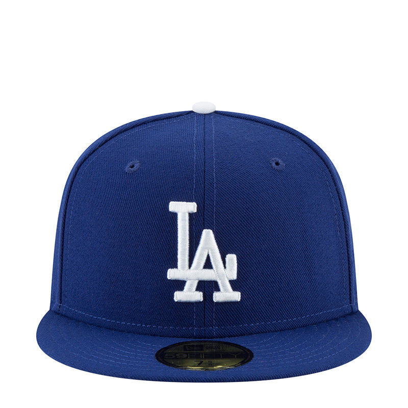 Royal blue baseball cap with white LA logo on front