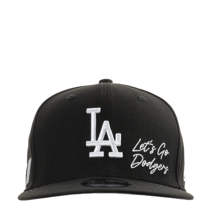 Black baseball cap with white LA logo and 'Let's Go Dodgers' script on front