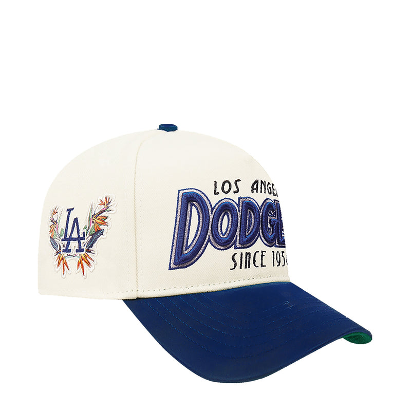 Cream and blue Dodgers baseball cap with LA side logo and curved blue brim