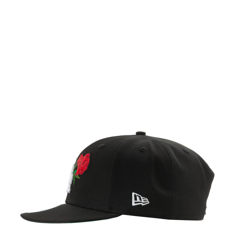 Black baseball cap with red rose patch and New Era logo