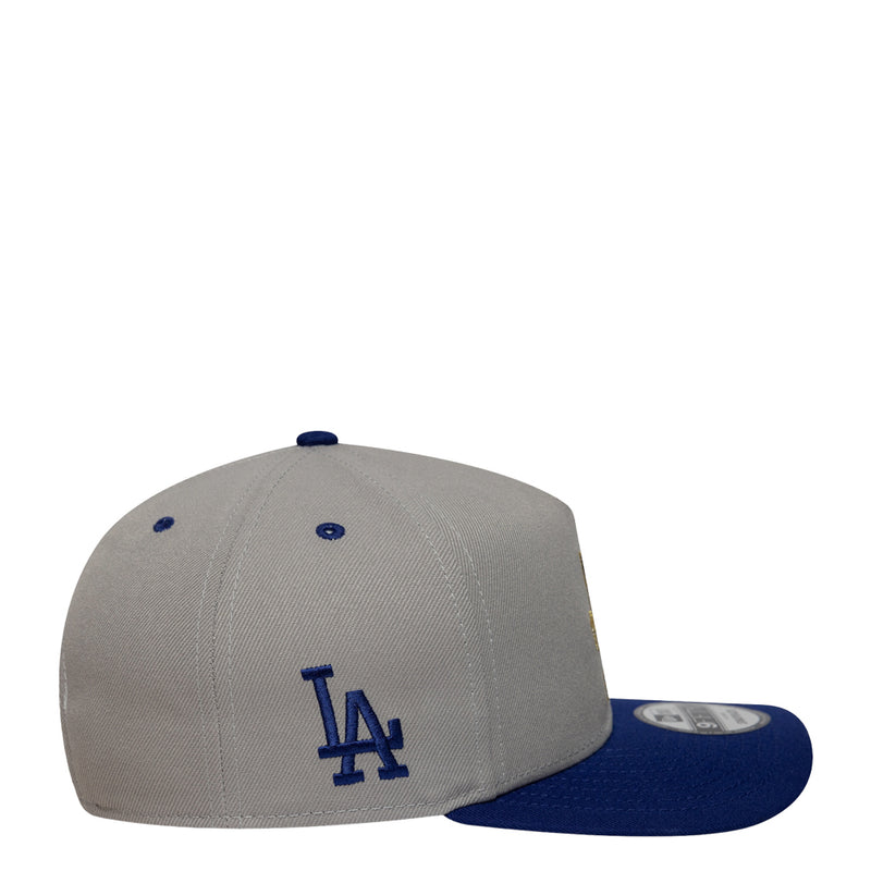Two-tone grey and blue baseball cap with LA logo on side