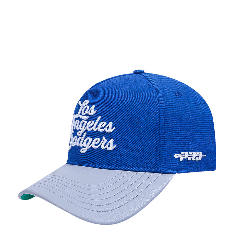Two-tone strapback cap, blue front panel with Los Angeles Dodgers script and light gray brim