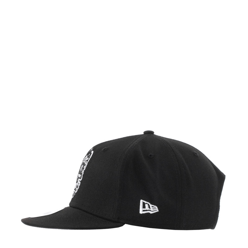 Black baseball cap with New Era logo and white chain embroidery on side