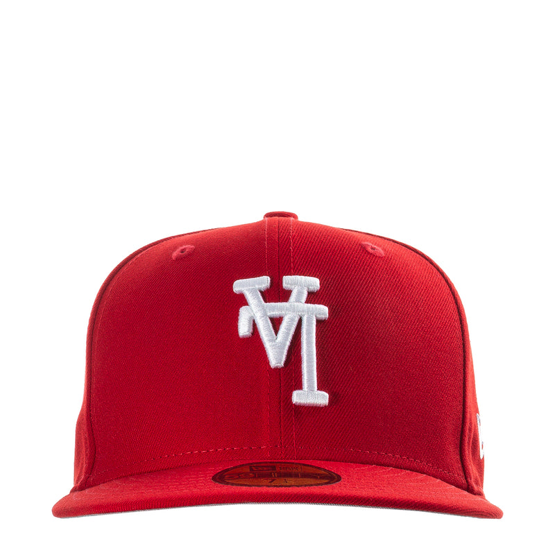 Red baseball cap with white upside-down logo embroidery