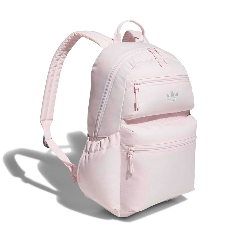 Light pink double-stacked backpack with front zip pocket, logo and padded shoulder straps.