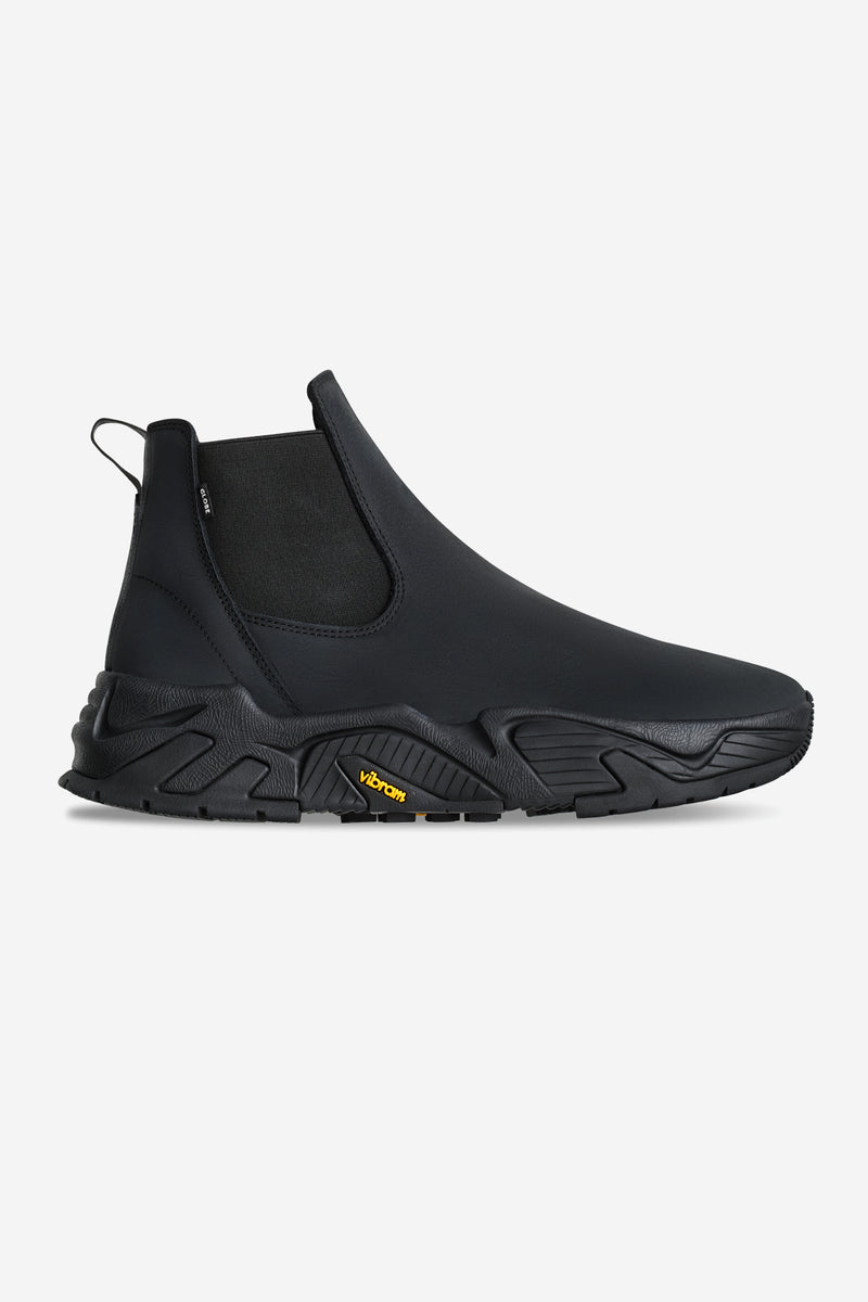 DOVER-2000 black leather Chelsea boot with elastic side panels and rugged Vibram sole.