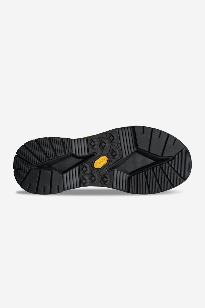 Bottom view of black Dover 2000 boot showing rugged tread and Vibram outsole