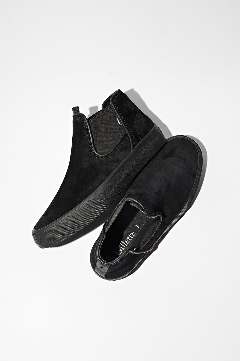 Pair of black Dover slip on sneakers with elastic panels and pull tab viewed from above