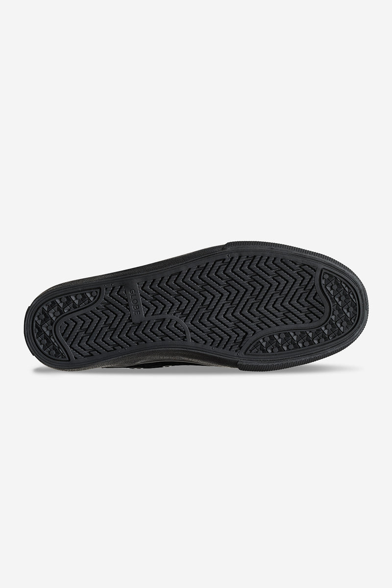 Outsole of black Dover shoe featuring herringbone tread and circular grip details