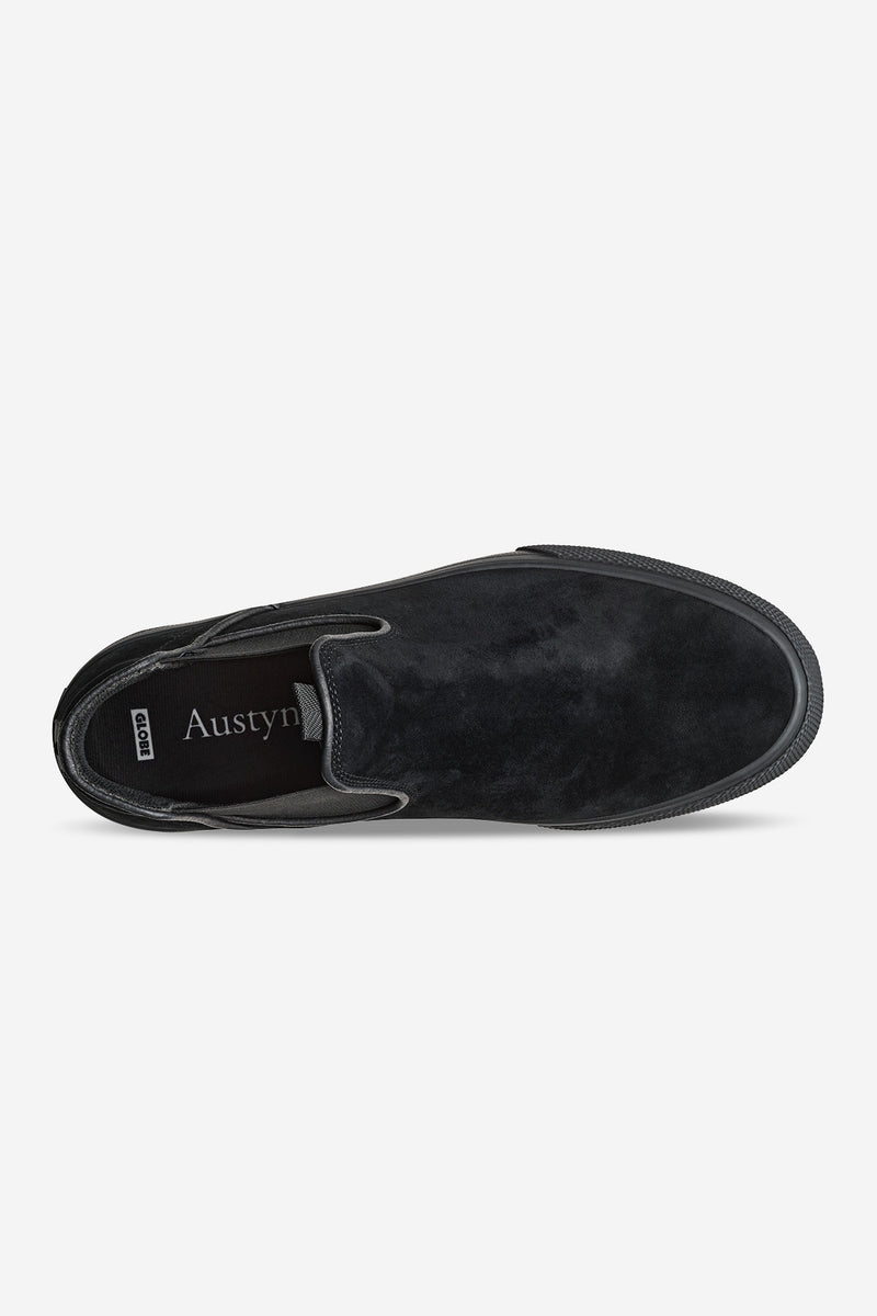 Top view of a Dover black suede skate shoe with interior padding and Austyn branding on the insole