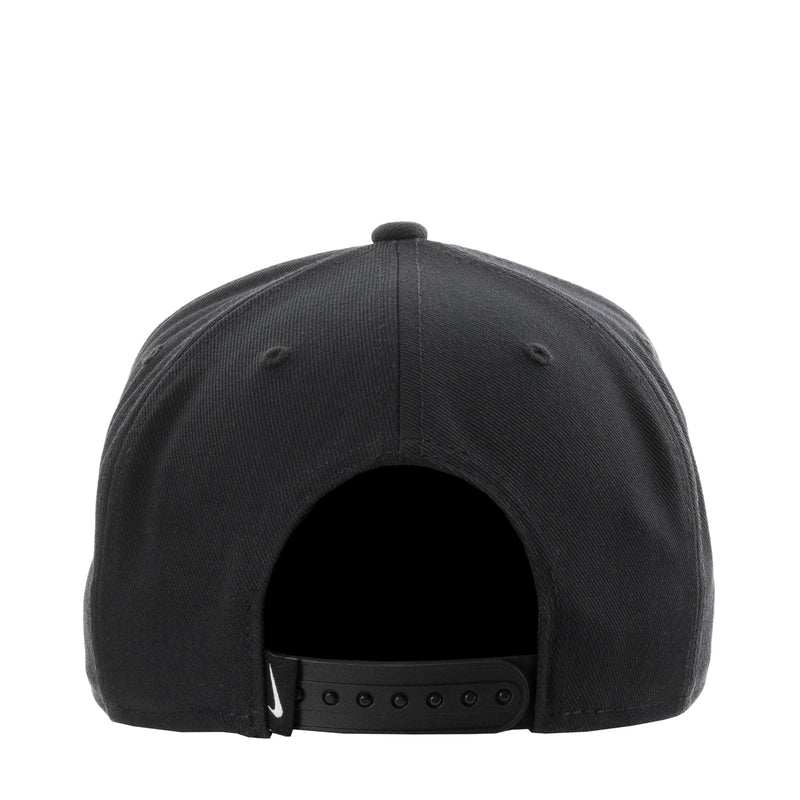 Black Nike cap back with adjustable strap and metal grommets