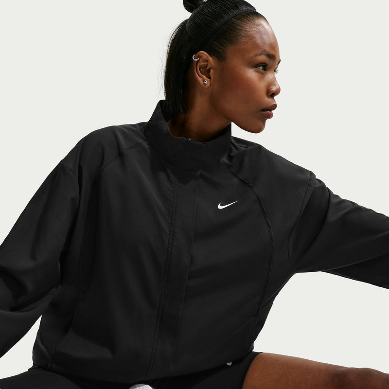 Women's black woven jacket close-up with full-zip front and Nike swoosh.