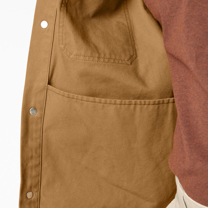 Brown duck shirt jacket lower pocket with flap and visible seam stitching