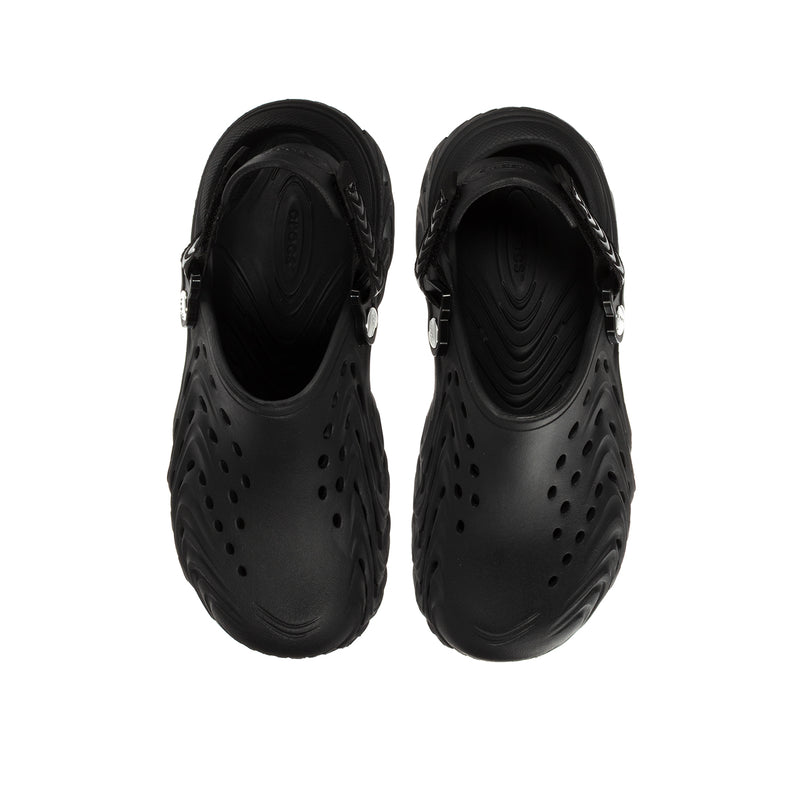 Black youth clogs, front view with perforations and buckled slingback strap