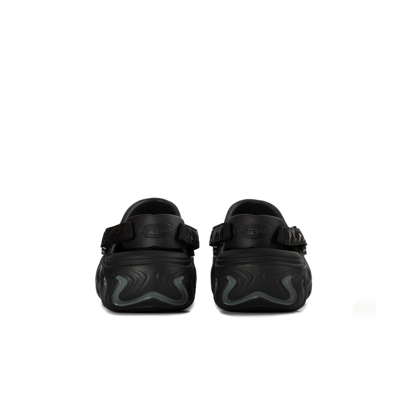 Black youth clogs, heel view with strap and contoured outsole tread