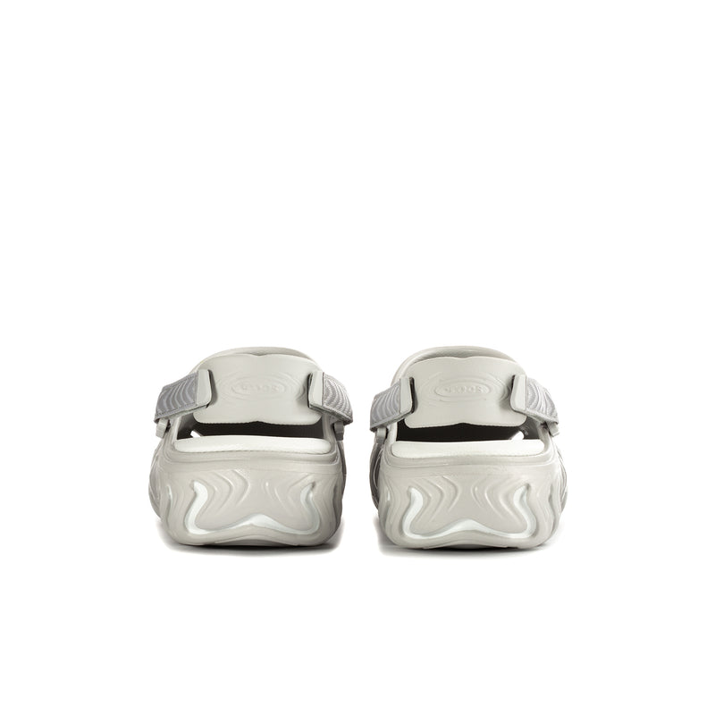 Mens white clogs shown from back, with adjustable heel strap and textured heel