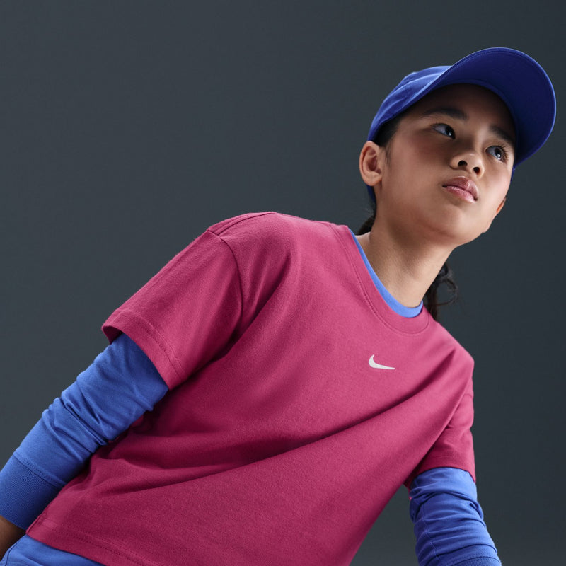 Youth boxy tee in sweet beet pink with Nike swoosh on chest