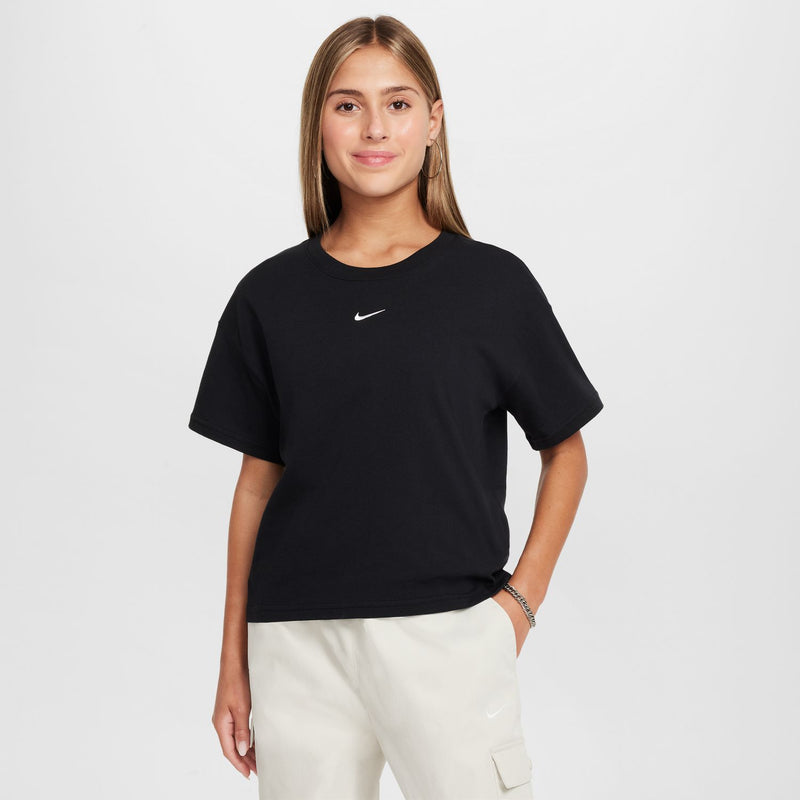 Youth black boxy T-shirt with small Nike swoosh at center chest
