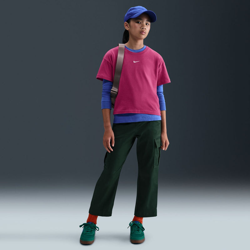 Youth boxy tee in sweet beet pink with Nike swoosh, crew neck style