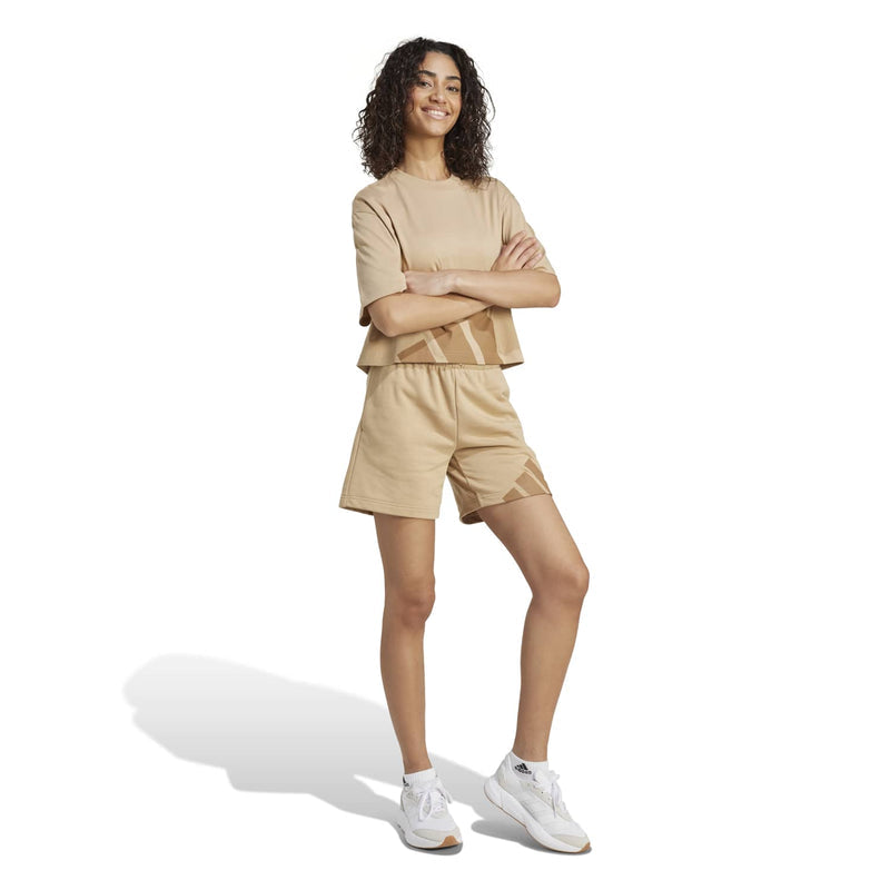 Warm sandstone crew-neck tee with oversized front logo graphic
