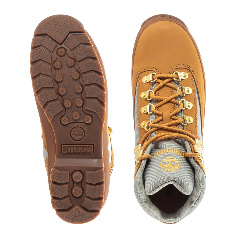 Men's Timberland hiker boot, rugged outsole tread and tan leather upper with laces