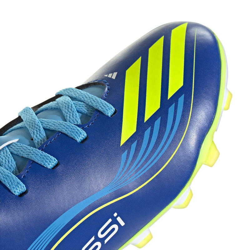 Youth soccer cleat close-up, blue upper with lace eyelets and F50 graphic