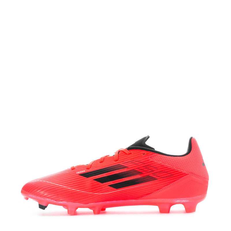 Red men's football boot with black logo stripe, studded outsole, and lace-up front.